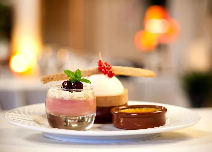 Logis & Restaurant Arcombelle 호텔 몽티그니레로아